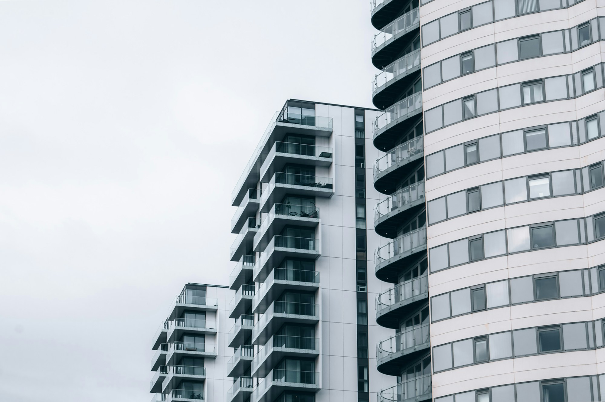 Modern UK new-build apartment towers with glass balconies